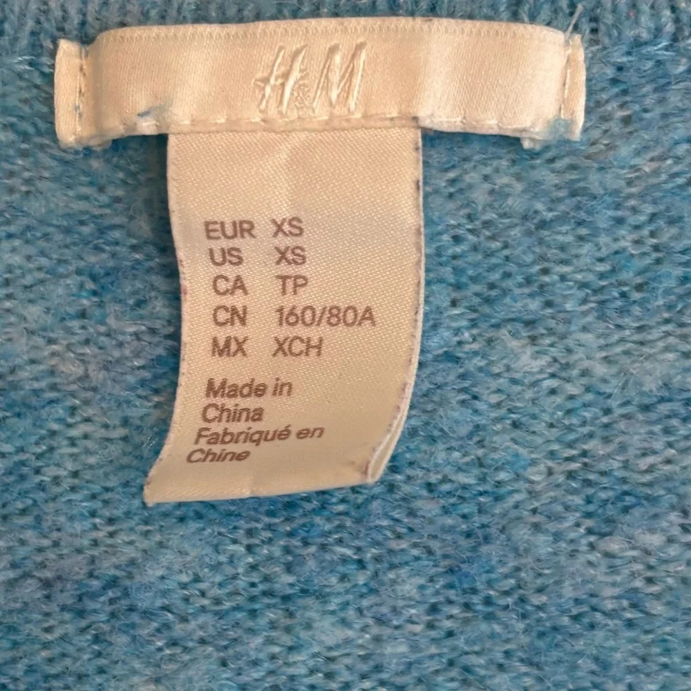 H&M Light Blue V-Neck Sweater (XS)